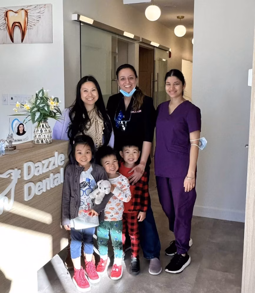 Jeff & Tiffany Abaquin with the Dazzle Dental team at reception